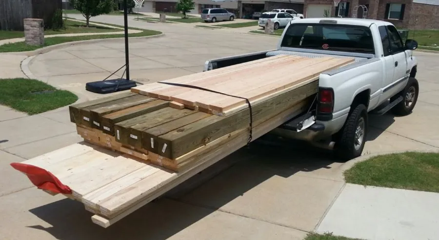 how far can lumber stick out of a truck